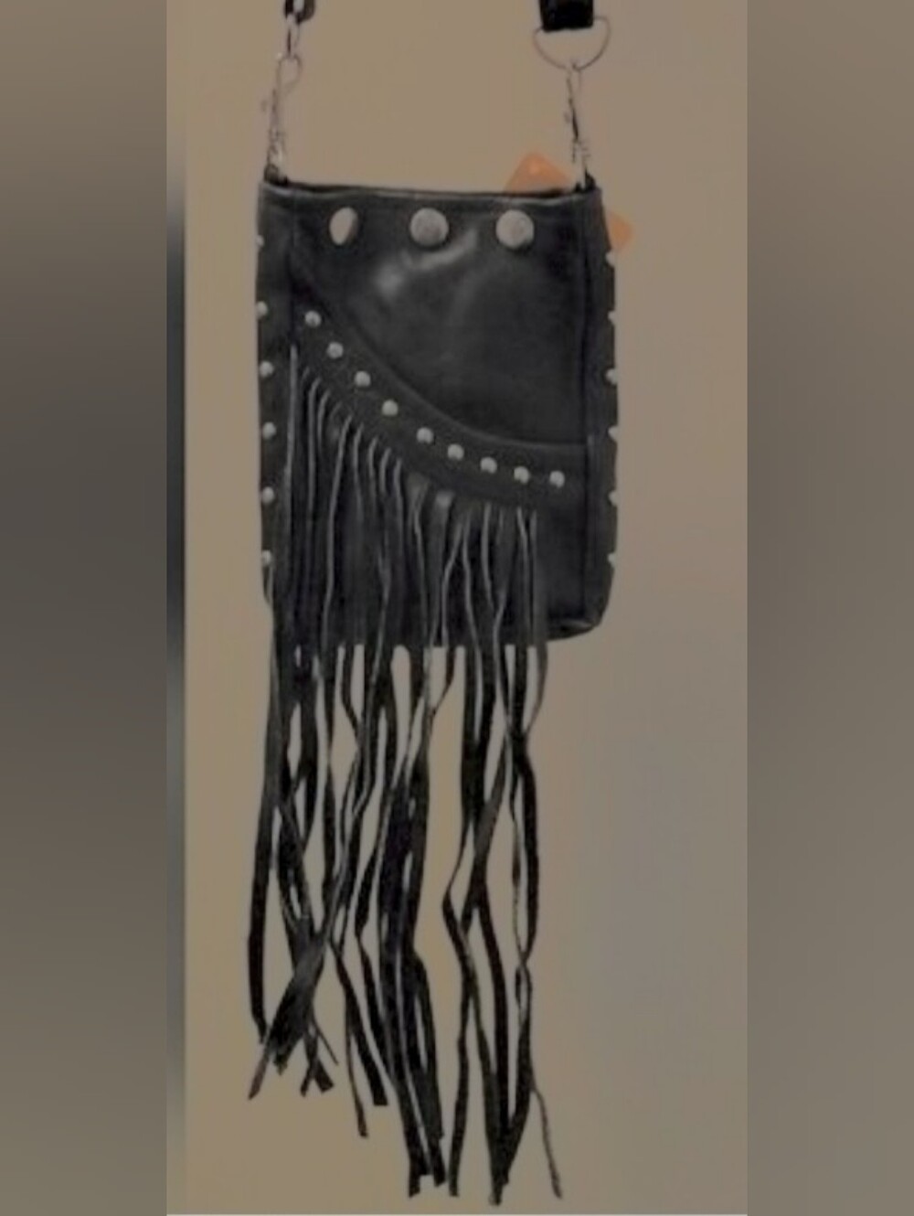 Black Leather Crossbody Bag With Fringe And Silver Studs On Outside Pocket